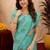 Sea green linen jacuard bird motif work bird saree with unstitched blouse piece