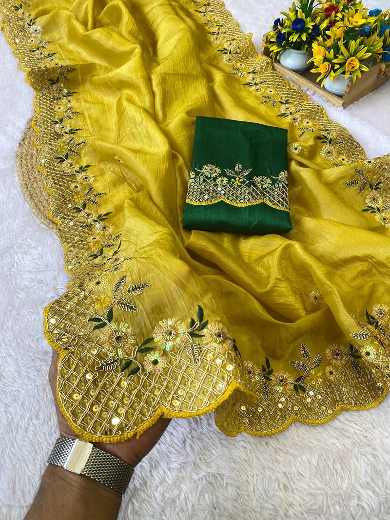 Yellow coding embroidery work gold crush saree with blouse
