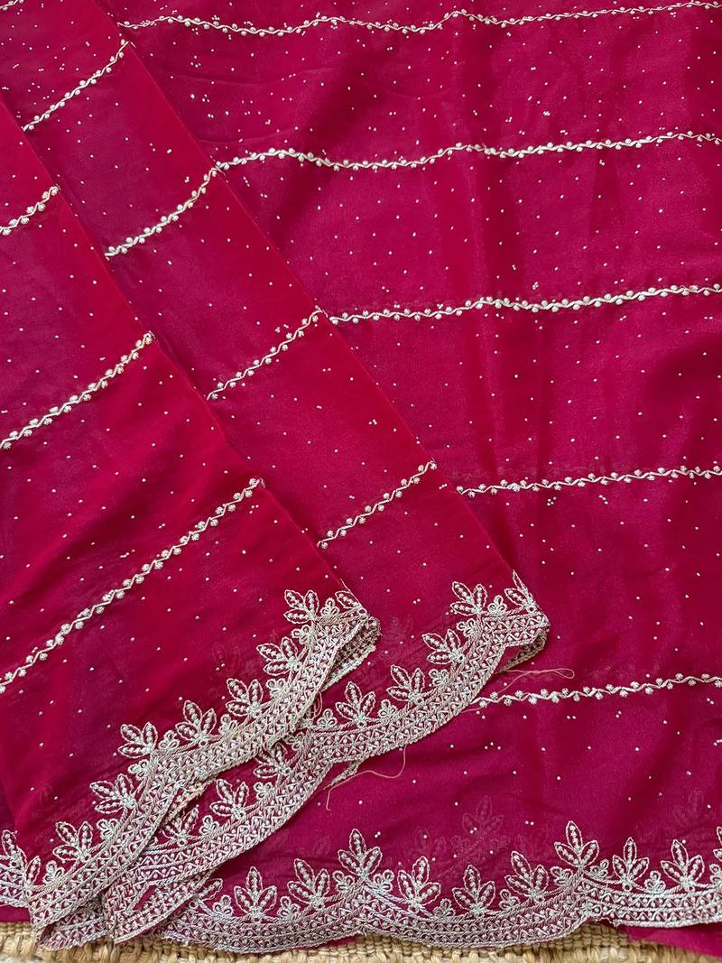 Pink zari embroidery work star georgette saree with blouse