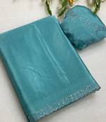Blue zharkan stone work chinon saree with blouse