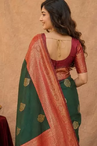 Sea green art silk blend banarasi jacquard motif work saree with unstitched blouse piece