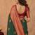 Sea green art silk blend banarasi jacquard motif work saree with unstitched blouse piece