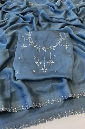 Blue zharkan stone work chiffon saree with blouse