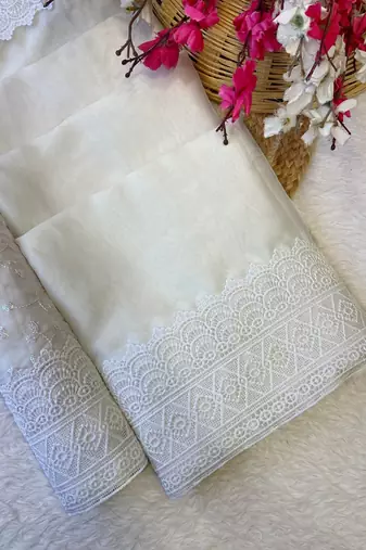 White zari embroidery work rangoli saree with blouse