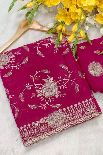 Pink zari embroidery work star georgette saree with blouse