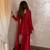 Red embroidered kurta with flared palazzo suit set