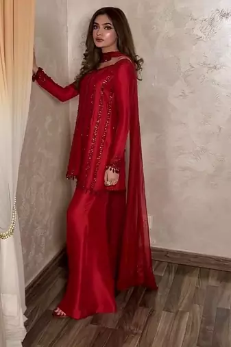Red embroidered kurta with flared palazzo suit set
