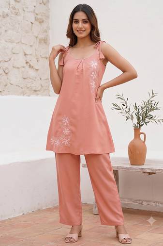 Women floral embroidered strappy a-line tunic kurti with straight pant set