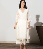 Off-white a-line kali kurta set with threadwork embroidery, stitched