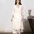 Off-white a-line kali kurta set with threadwork embroidery, stitched
