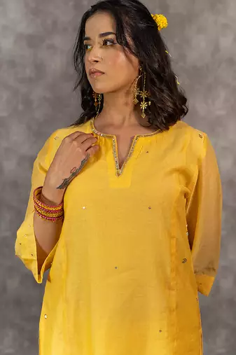 Yellow chanderi hand embellished a-line kurta set with dupatta, stitched