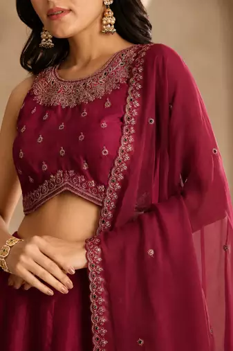 Maroon Embroidery Work Lehenga choli with dupatta.