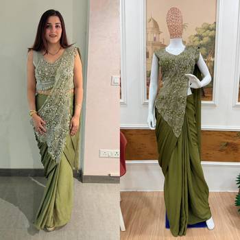 Olive green embroidered saree with intricate silver zari work 2