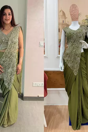 Olive green embroidered saree with intricate silver zari work