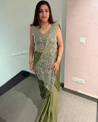 Olive green embroidered saree with intricate silver zari work 3