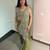 Olive green embroidered saree with intricate silver zari work