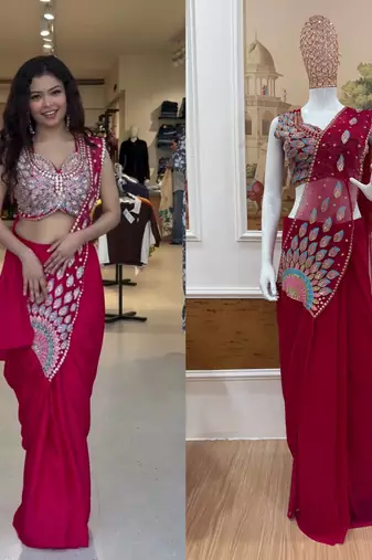 Royal fuchsia embroidered saree with peacock motif blouse