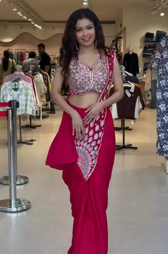 Royal fuchsia embroidered saree with peacock motif blouse