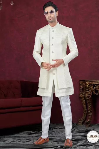 Cream embroidered indo-western sherwani set with thread, stone & fancy button work.