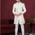 Cream embroidered indo-western sherwani set with thread, stone & fancy button work.