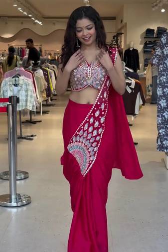 Royal fuchsia embroidered saree with peacock motif blouse