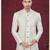 Cream embroidered indo-western sherwani set with thread, stone & fancy button work.