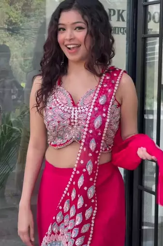 Royal fuchsia embroidered saree with peacock motif blouse