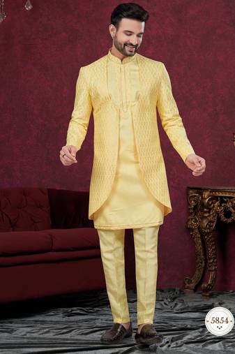 Yellow embroidered indo-western sherwani set with thread, stone & fancy button work.