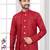 Red embroidered indo-western sherwani set with thread, stone & fancy button work.