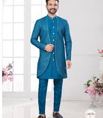 Blue embroidered jacket attached indo-western sherwani set with thread, stone & fancy button work.
