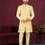 Yellow embroidered jacket attached indo-western sherwani set with thread, stone & fancy button work.