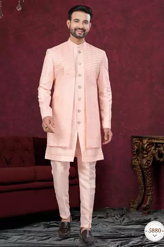 Peach embroidered jacket attached indo-western sherwani set with thread, stone & fancy button work.