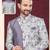 Purple cream embroidered jacket attached indo-western sherwani set with thread, stone & fancy button work.