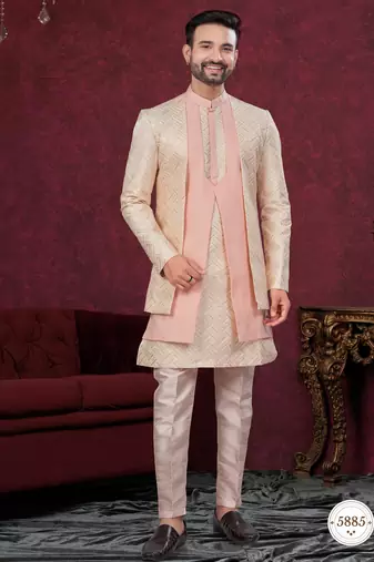 Peach cream embroidered jacket attached indo-western sherwani set with thread, stone & fancy button work.