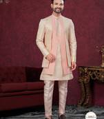 Peach cream embroidered jacket attached indo-western sherwani set with thread, stone & fancy button work.