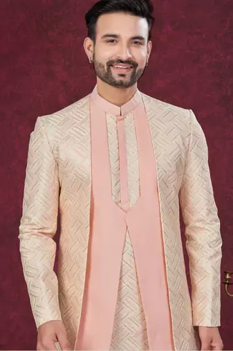 Peach cream embroidered jacket attached indo-western sherwani set with thread, stone & fancy button work.