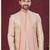 Peach cream embroidered jacket attached indo-western sherwani set with thread, stone & fancy button work.