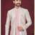 Pink off white embroidered jacket attached indo-western sherwani set with thread, stone & fancy button work.