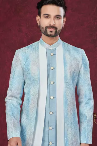 Blue off white embroidered jacket attached indo-western sherwani set with thread, stone & fancy button work.