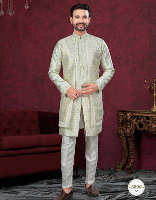 Green off white embroidered jacket attached indo-western sherwani set with thread, stone & fancy button work. 1