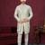 Green off white embroidered jacket attached indo-western sherwani set with thread, stone & fancy button work.