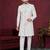 Grey off white embroidered jacket attached indo-western sherwani set with thread, stone & fancy button work.