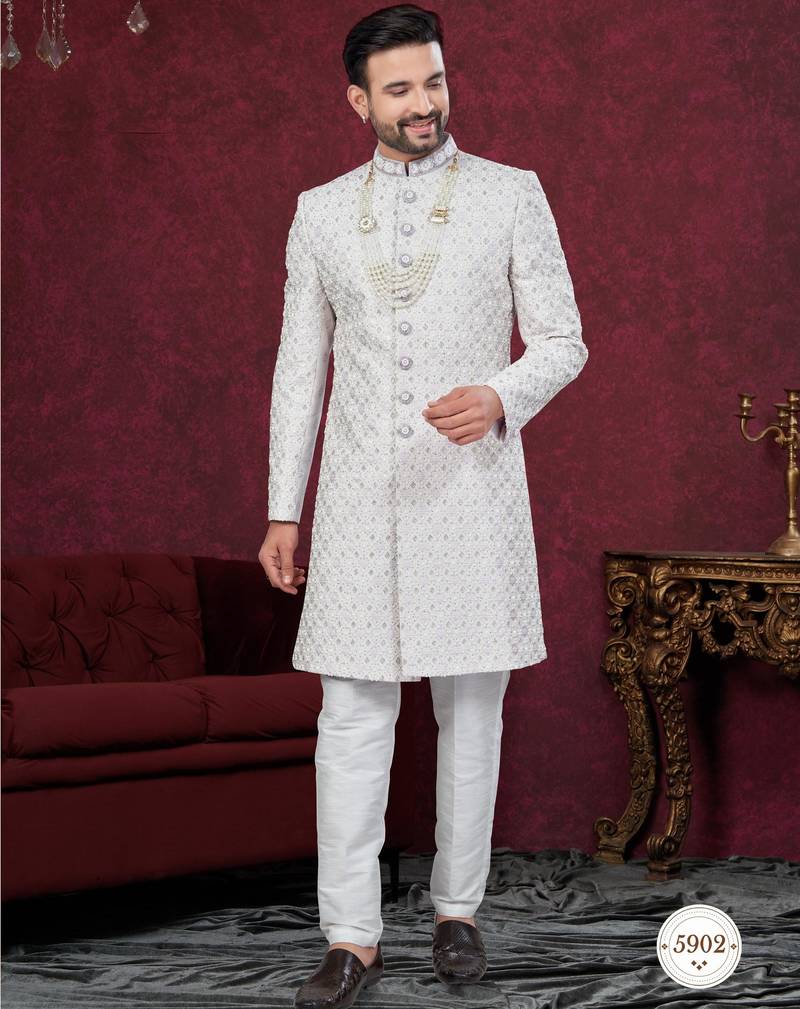 Grey off white embroidered jacket attached indo-western sherwani set with thread, stone & fancy button work.