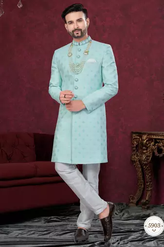 Mint green embroidered jacket attached indo-western sherwani set with thread, stone & fancy button work.