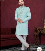 Mint green embroidered jacket attached indo-western sherwani set with thread, stone & fancy button work.