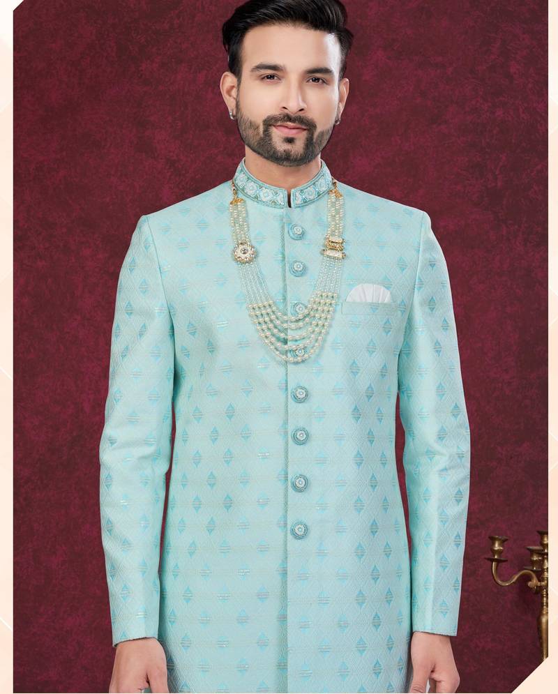 Mint green embroidered jacket attached indo-western sherwani set with thread, stone & fancy button work.