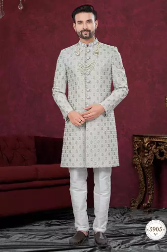 Grey embroidered jacket attached indo-western sherwani set with thread, stone & fancy button work.
