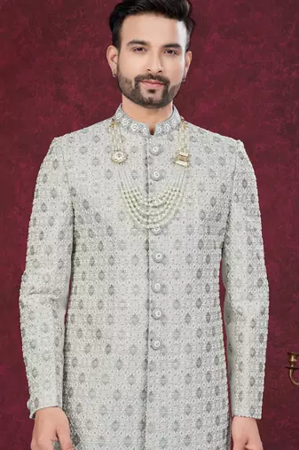 Grey embroidered jacket attached indo-western sherwani set with thread, stone & fancy button work.