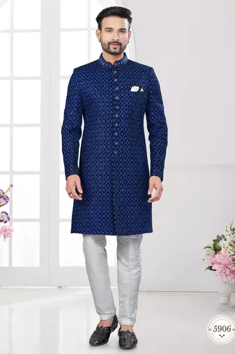 Blue black velvet embroidered  indo-western sherwani set with thread, stone & fancy button work.