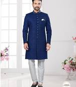 Blue black velvet embroidered  indo-western sherwani set with thread, stone & fancy button work.
